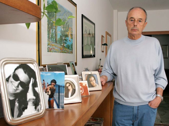 Beppino Englaro with photos of his daughter Eluana